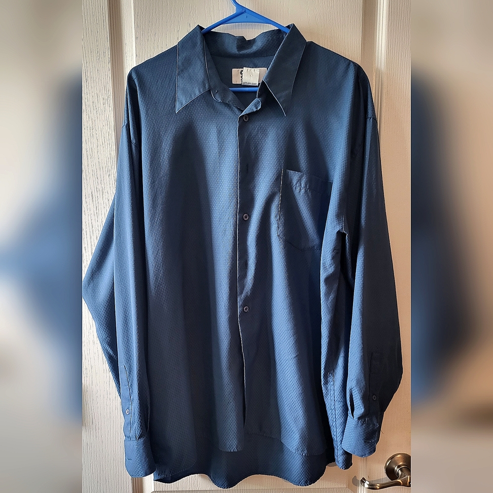 Blue long sleeved button up shirt